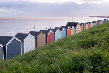 Beach huts on the promenade at Gorleston-on-sea in Norfolk, UK
