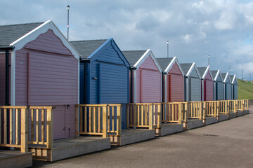 Beach huts on the promenade at Gorleston-on-sea in Norfolk, UK