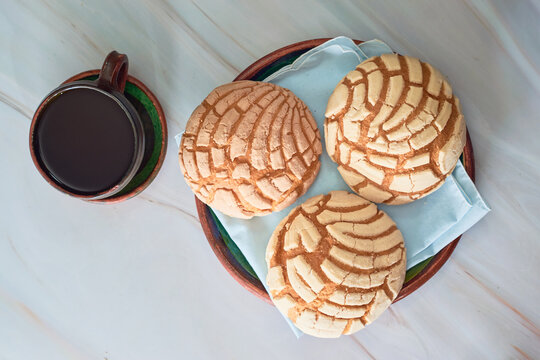 Concha, Mexican sweet bread with a cup of coffee.