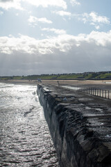 Sea defences/wall barrier with views looking towards the beach at Gorleston-on-sea in Norfolk, UK