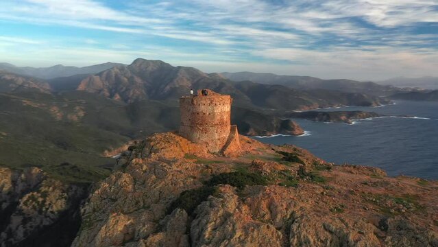 Vue a&eacute;rienne de drone du Capo Rosso (Capu Rossu) en Corse pr&egrave;s de Piana, 4K 25 fps - Aerial drone view of the Capo Rosso, Corsica