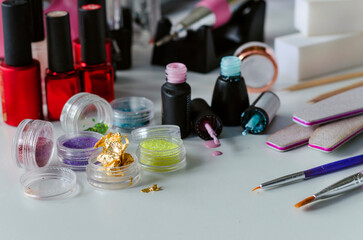 Obraz na płótnie Canvas Tools and accessories for manicure gel polish