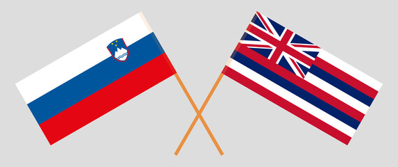 Crossed flags of Slovenia and The State Of Hawaii. Official colors. Correct proportion