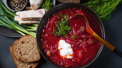 Traditional Ukrainian Russian borscht . Bowl of red beet root soup borsch with white cream . Beet...