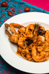 Gourmet shrimp in pasta and tomato sauce