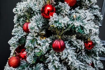 Christmas and New Year photo studio, tree, garlands, grey wall, balls (7). Idea for holiday like Christmas and New year, for covers books, magazines, articles.
