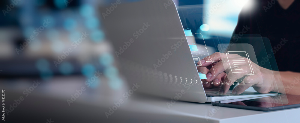 Poster  IT consultant being setup Virtual Document Management System (DMS) with laptop computer in office or wok from home.Software for archiving corporate files concept.