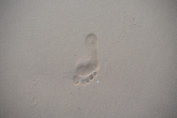 bare footprints on the beach
