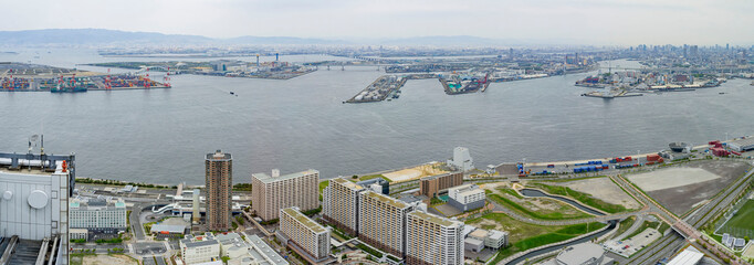 Overcast aerial view of Osaka port cityscape
