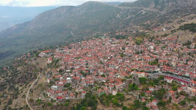 Aerial view of the beautiful greek village Arachova in the mountains of Greece, Europe. An area near the ancient Greek city of Delphi. Historic Village on a Hill.