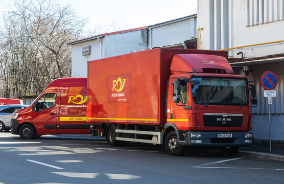 The car that carries parcels and letters. Romanian Post car parked to unload cargo. Romania, Severin, February, 19, 2022