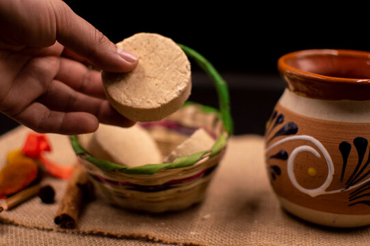 Mazapan with traditional basket and cup of chocolate