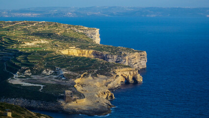 The Cliffs of Gozo and the Island of Malta in the background