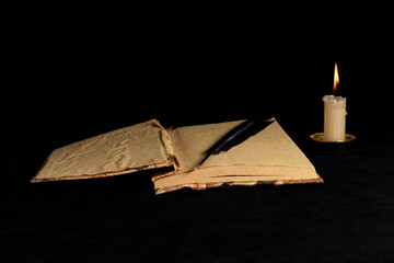 Ancient paper scrolls sealed with a seal on an old map. Pen for writing.