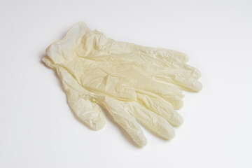 White medical gloves on a white background. Rubber medical gloves. Individual protection means.