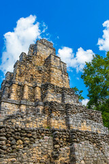 Ancient Mayan site with temple ruins pyramids artifacts Muyil Mexico.