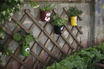 hand-painted recycled flower pots