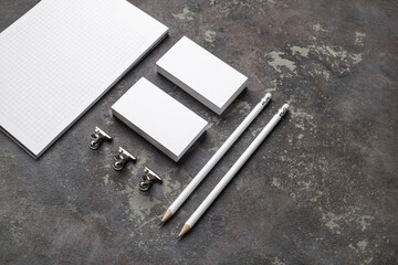 Branding stationery mockup. Blank objects for placing your design on concrete background.