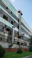 industrial air conditioner. Air conditioner units HVAC on a roof of industrial building with blue...