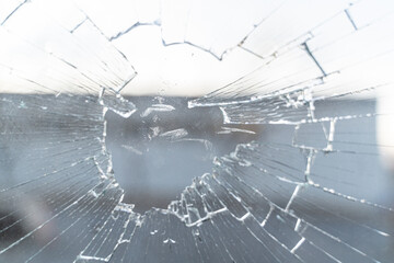 looking through a Broken Window from inside a factory