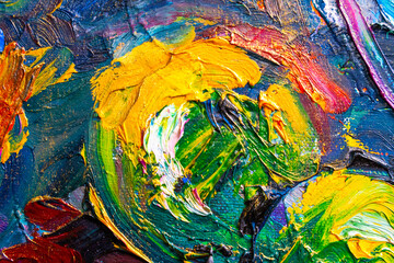 Fototapeta premium Abstract image painted with large sweeping strokes of oil paint on the surface of canvas, close up. Creative work of the artist. Colorful and bright background.
