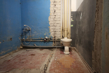 Old vintage dirty toilet bowl. Trash repairs. Grunge horizontal background.