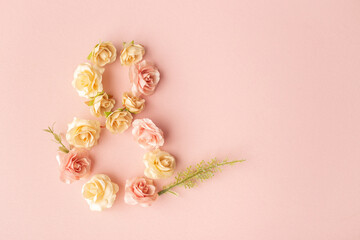 March 8th. Happy Women's Day. Creative layout. Composition in the form of the number eight of...