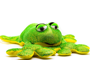 Fototapeta premium Yellow and gold plush frog on a white background