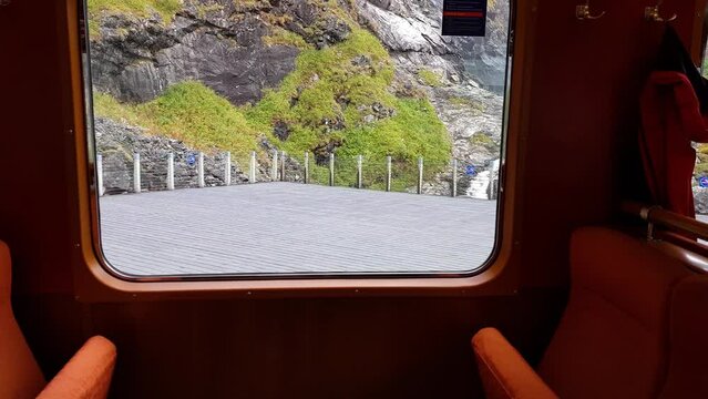 View of a waterfall from a train window