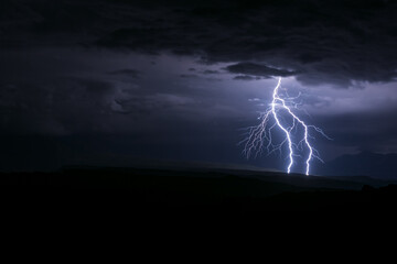 Naklejka na ściany i meble Lightning storm in Arches National Park, Utah