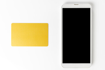 スマートフォンとクレジットカードの金融イメージ