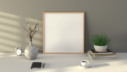 Square BBB picture poster frame mock up. Cup of coffee, books, vase and notebook on white table. Gray wall background.
