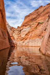 Lake Powell kayaking through Antelope slot canyon and red rock formations desert landscape vertical...