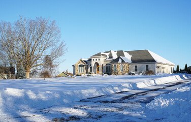 luxury house in after snow storm in winter 