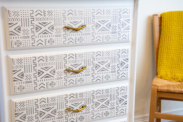Boho Chalk Painted dresser with stenciled design and mid-century modern pulls. Bohemian chic...