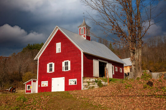A red barn with coupela in rural Vermont near Strafford