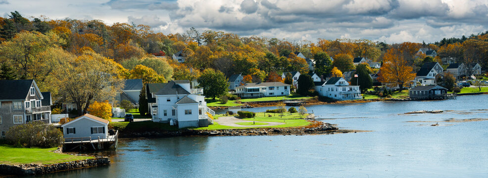 A panorama image of Homes on the waterfront on Boothbay Harbor, Vermont,