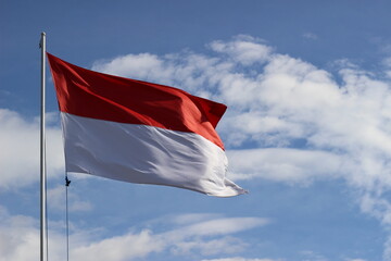 Fototapeta na wymiar Indonesian flag, red and white flag, symbol of the state of Indonesia, Indonesian independence day. suitable for use during national celebrations.