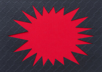irregular abstract shape (starburst, sun) - black on red