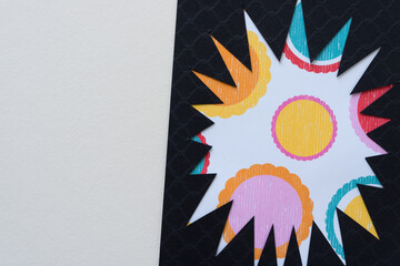 irregular abstract shape (starburst, sun) - black on floral shapes