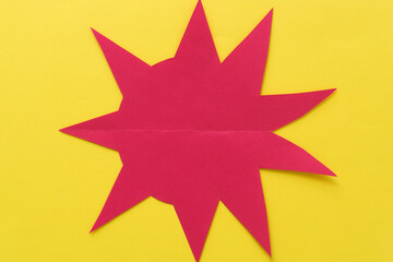 irregular abstract shape (starburst, sun) - red on yellow