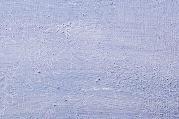 abstract background: light textured plaster, color toning, close