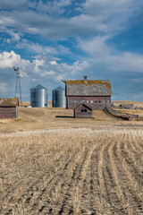 Abandoned farm buildings on the prairies in Saskatchewan, Canada