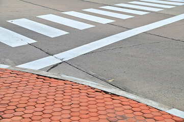 Empty Crosswalk black and white color on concrete road for people crossing at Thailand, Concept for safety in crossing the road from cars on the road.