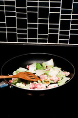  stir fried vegetable, stir fried Chinese cabbage or stir fried cabbage with minced pork in the pan or cooking