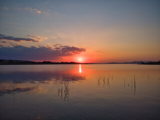 Obraz premium sunset over the lake