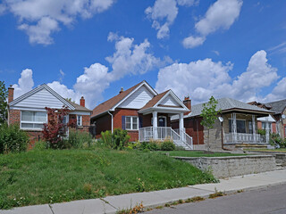 Residential street with small brick bungalows