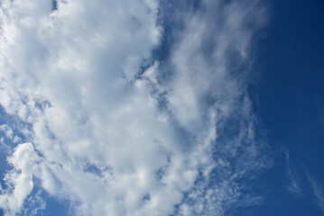 Naklejka na ściany i meble Blue sky and white clouds for background.