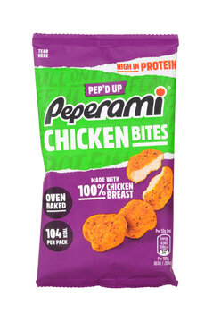Peperami chicken bites cooked chopped and shaped chicken in a smoky tikka style glaze oven baked snack food
