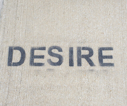 "Desire" Stenciled with Spray Paint on Sidewalk	